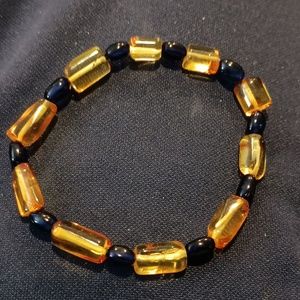 Unisex 7.5 inch Blue and Honey Colored Genuine Baltic Amber stretch  bracelet